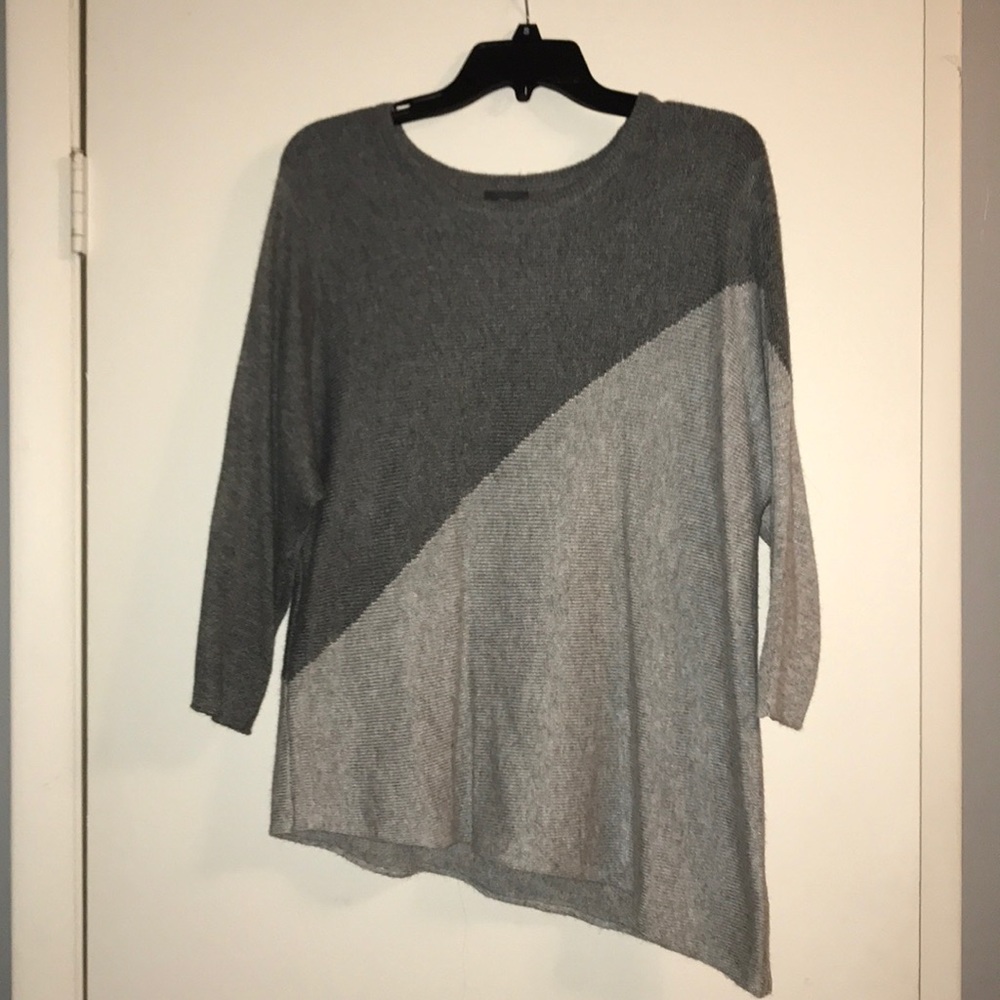 Brand new without tags assymetrical sweater